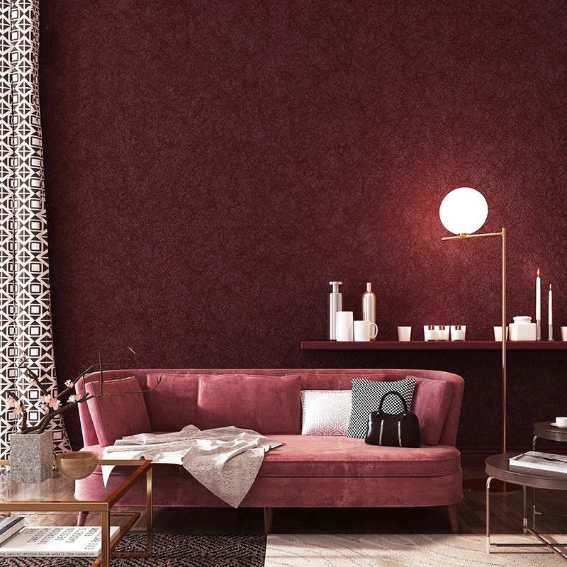 burgundy peel and stick wallpaper accent wall in an elegant living room
