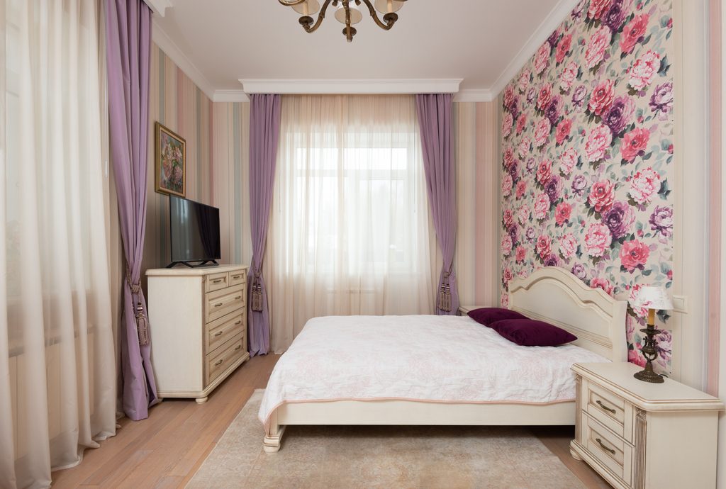 floral peel and stick wallpaper in a cozy bedroom
