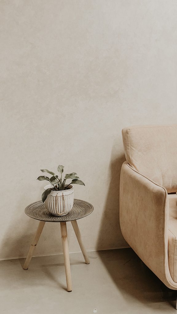textured neutral peel and stick wallpaper in a cozy living room
