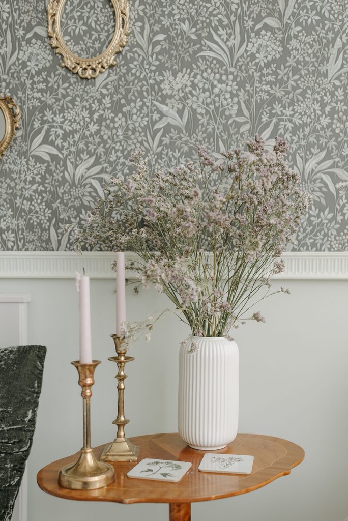 botanical peel and stick wallpaper in a powder room